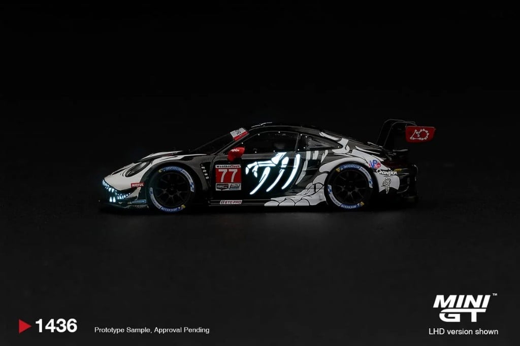 MINI GT Porsche 911 GT3 R (992) #77 AO Racing "Skeleton Rexy" 2026 IMSA Petit Le Mans (Glow in the Dark) photo 2